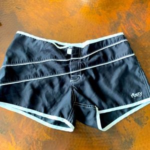 Rusty brand black board shorts size 1.